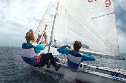 two people sailing