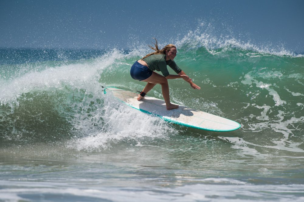 a woman surfing
