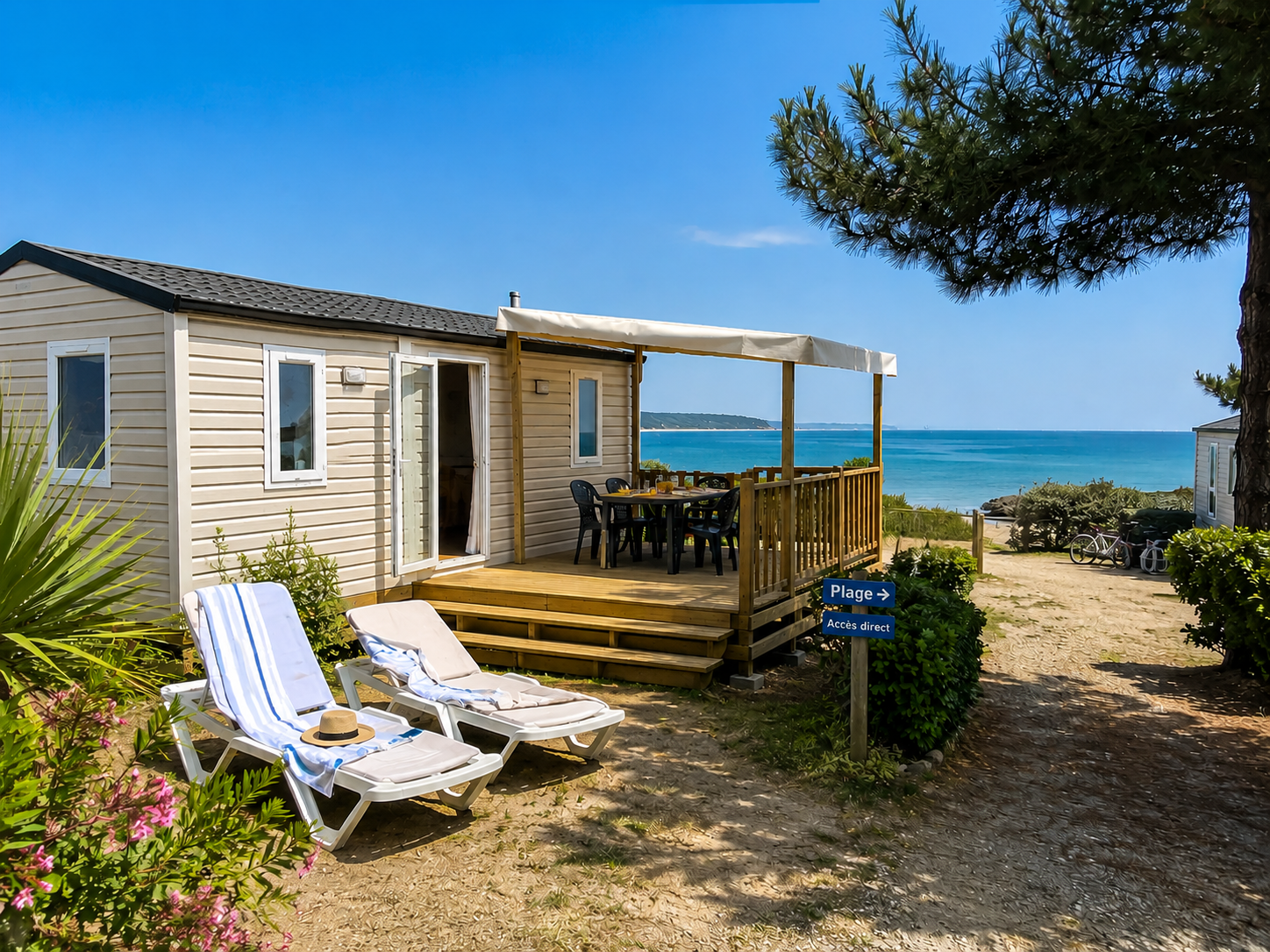 un mobil home dans un camping au bord de mer